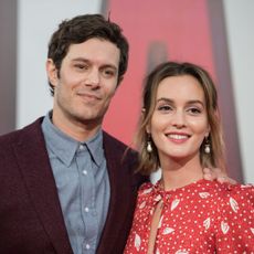 Adam Brody and Leighton Meester attend the world premiere of SHAZAM!