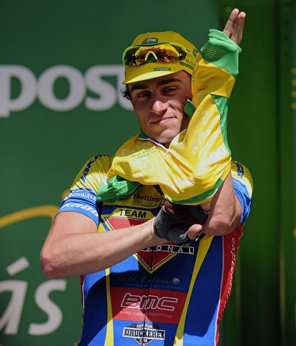 Nicolas Baldo (Atlas Jakroo) pulls on the An Post race leader's yellow jersey