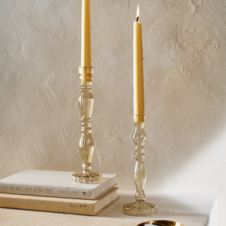 two tinted glass candlesticks