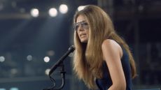 Gloria Steinem giving a speech in the 1970s.