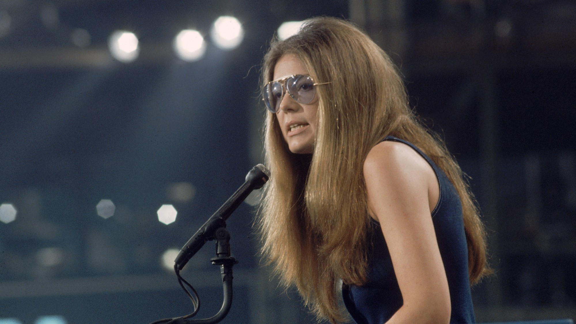 Gloria Steinem giving a speech in the 1970s.