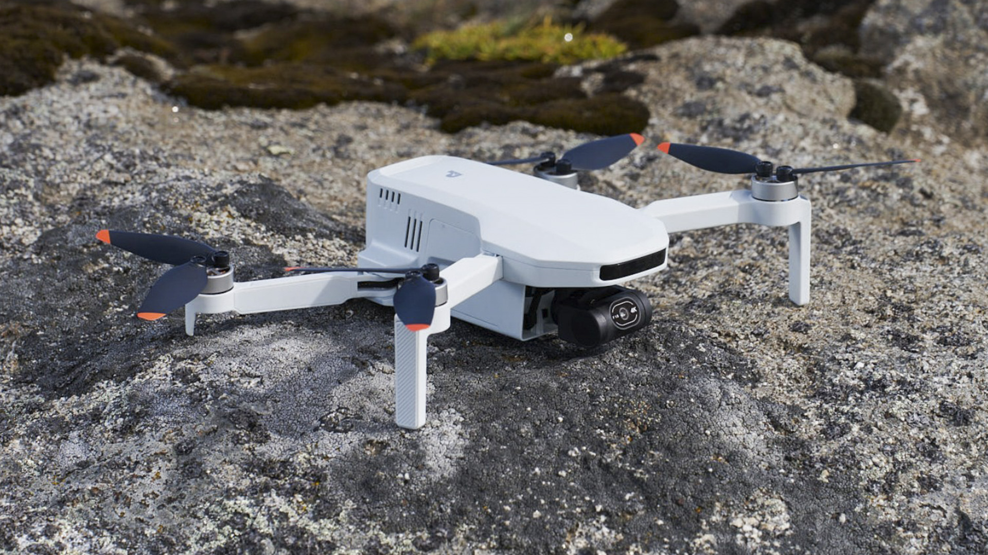 Potensic Atom 2 drone on a rock