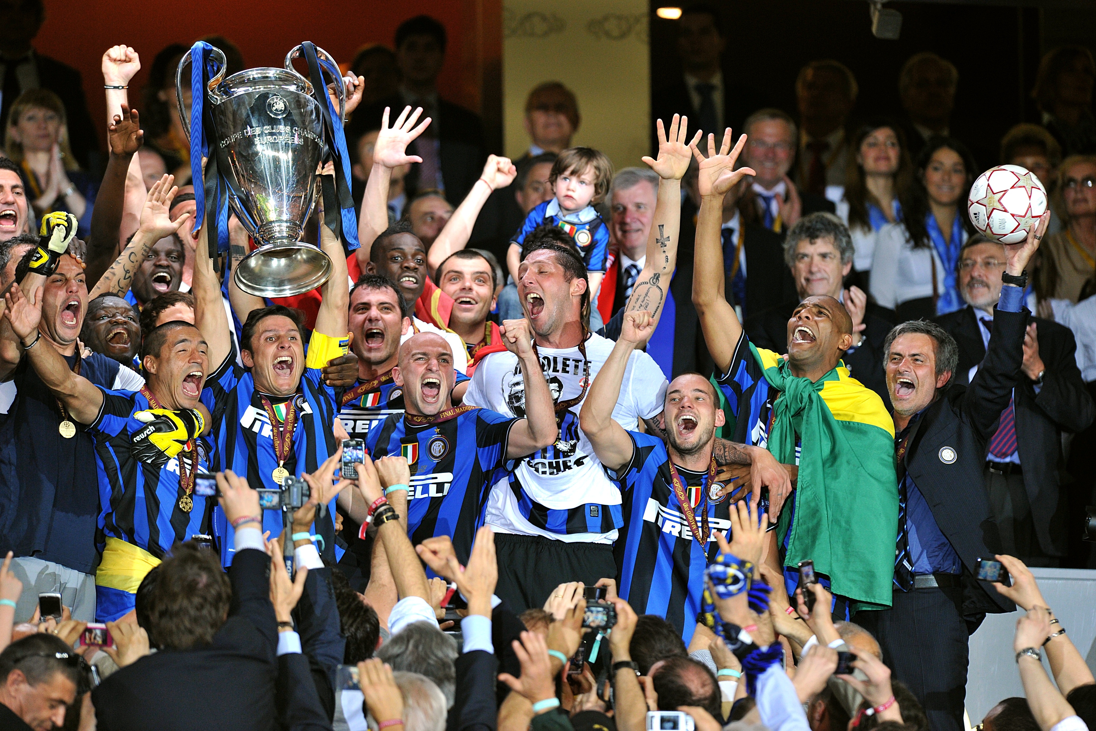 Mourinho, far right, celebrates Champions League success with Inter
