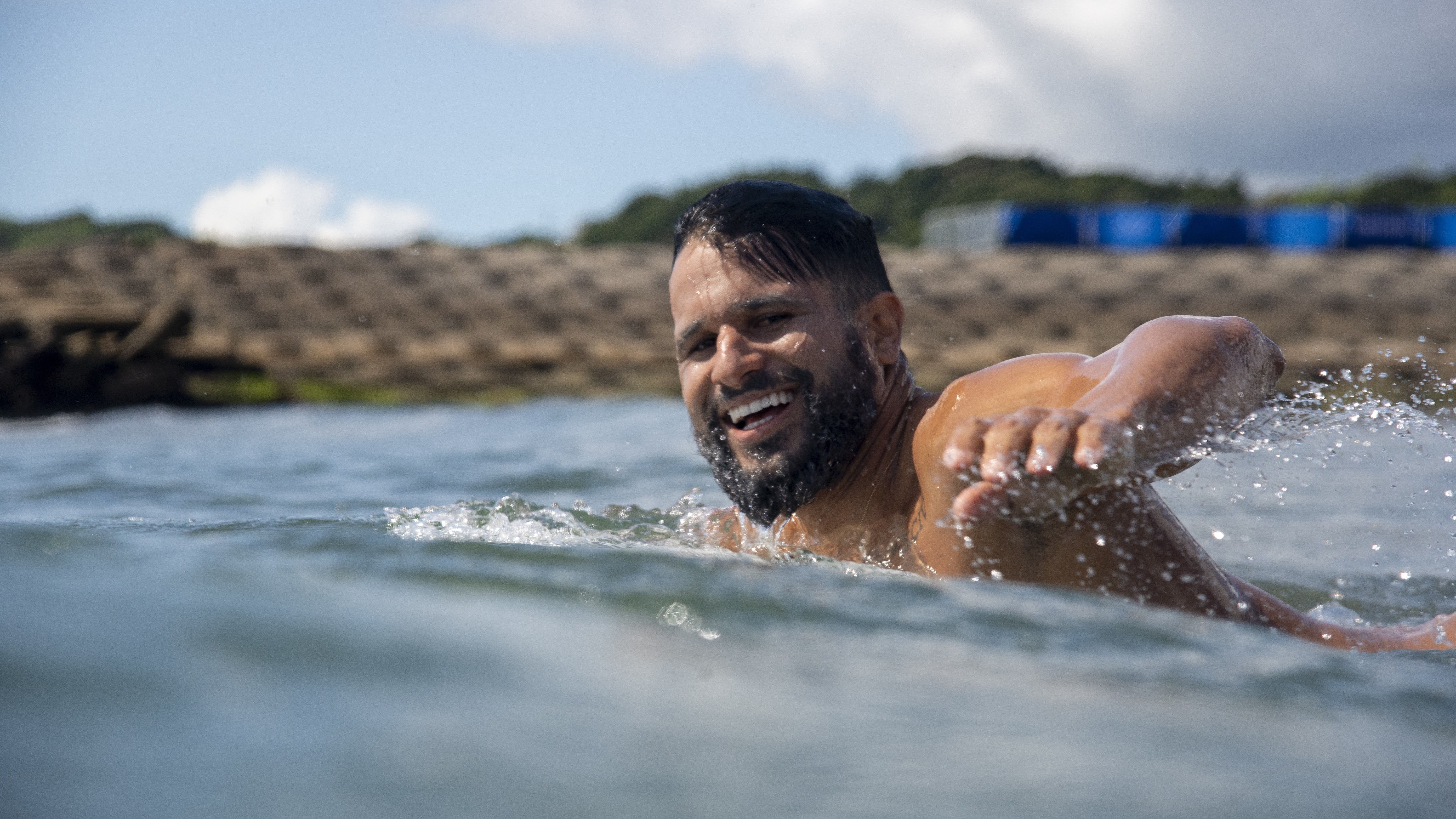 Brazilian surfer Italo Ferreria paddles out to catch a wave as he prepares for the 2020 Tokyo Olympics