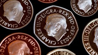 The new coins showing King Charles's face in profile