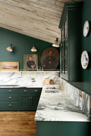 Kitchen countertop materials, marble worksurface in green kitchen by deVOL