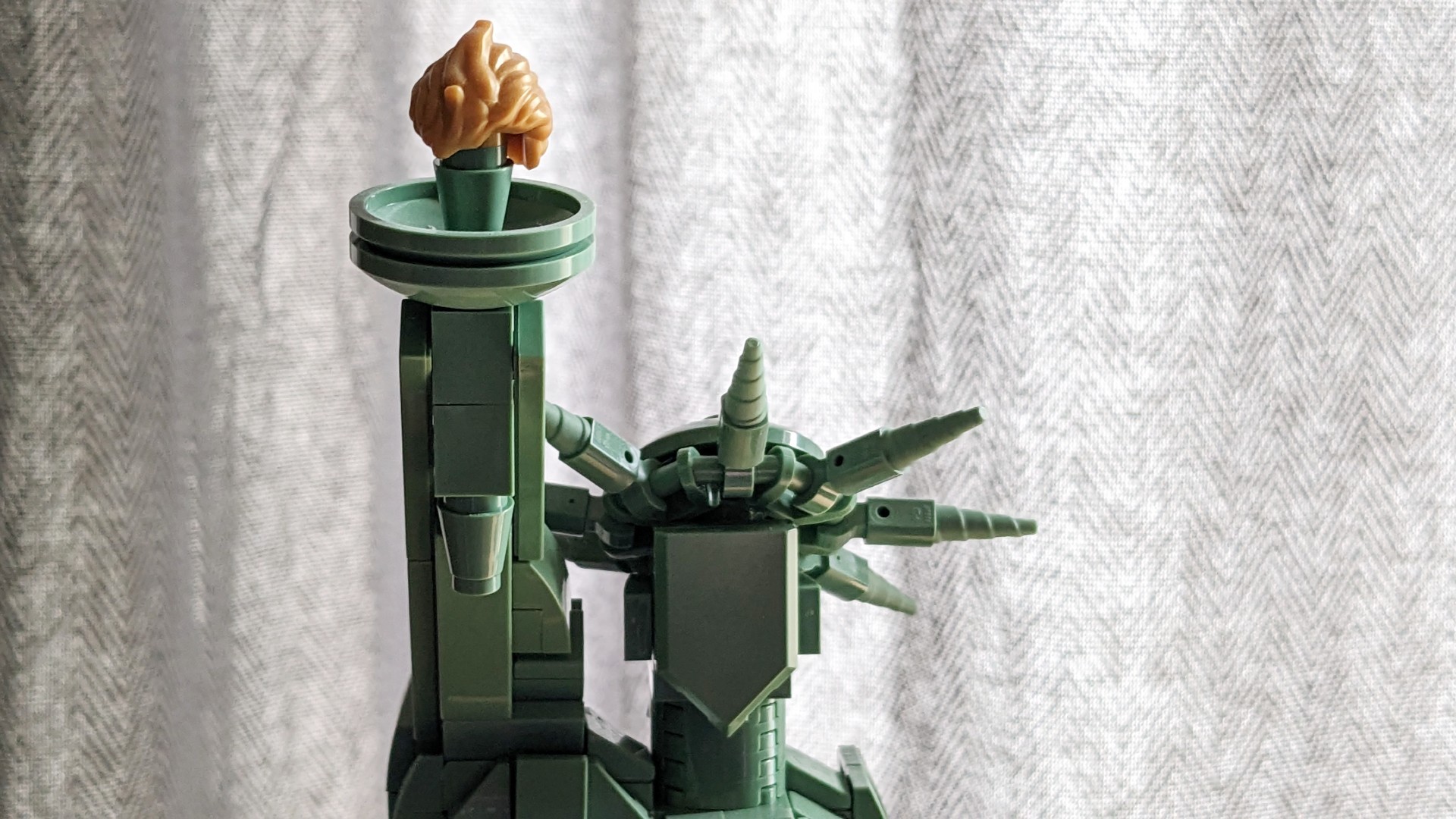 Lego Architecture Statue of Liberty 21042 - close up of head and golden torch.