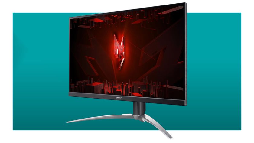 An image of an Acer gaming monitor against a teal background with a white border