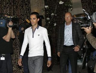 Alberto Contador and Bjarne Riis arrive for Friday's press conference.
