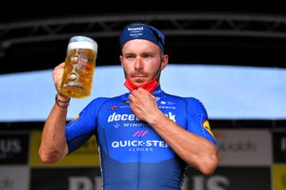 BOORTMEERBEEK BELGIUM SEPTEMBER 18 Florian Senechal of France and Team Deceuninck QuickStep celebrates with a beer at podium as race winner during the 11th Primus Classic 2021 a 1977km race from Brakel to Boortmeerbeek Wespelaar Haacht primusclassic PrimusClassic on September 18 2021 in Boortmeerbeek Belgium Photo by Luc ClaessenGetty Images