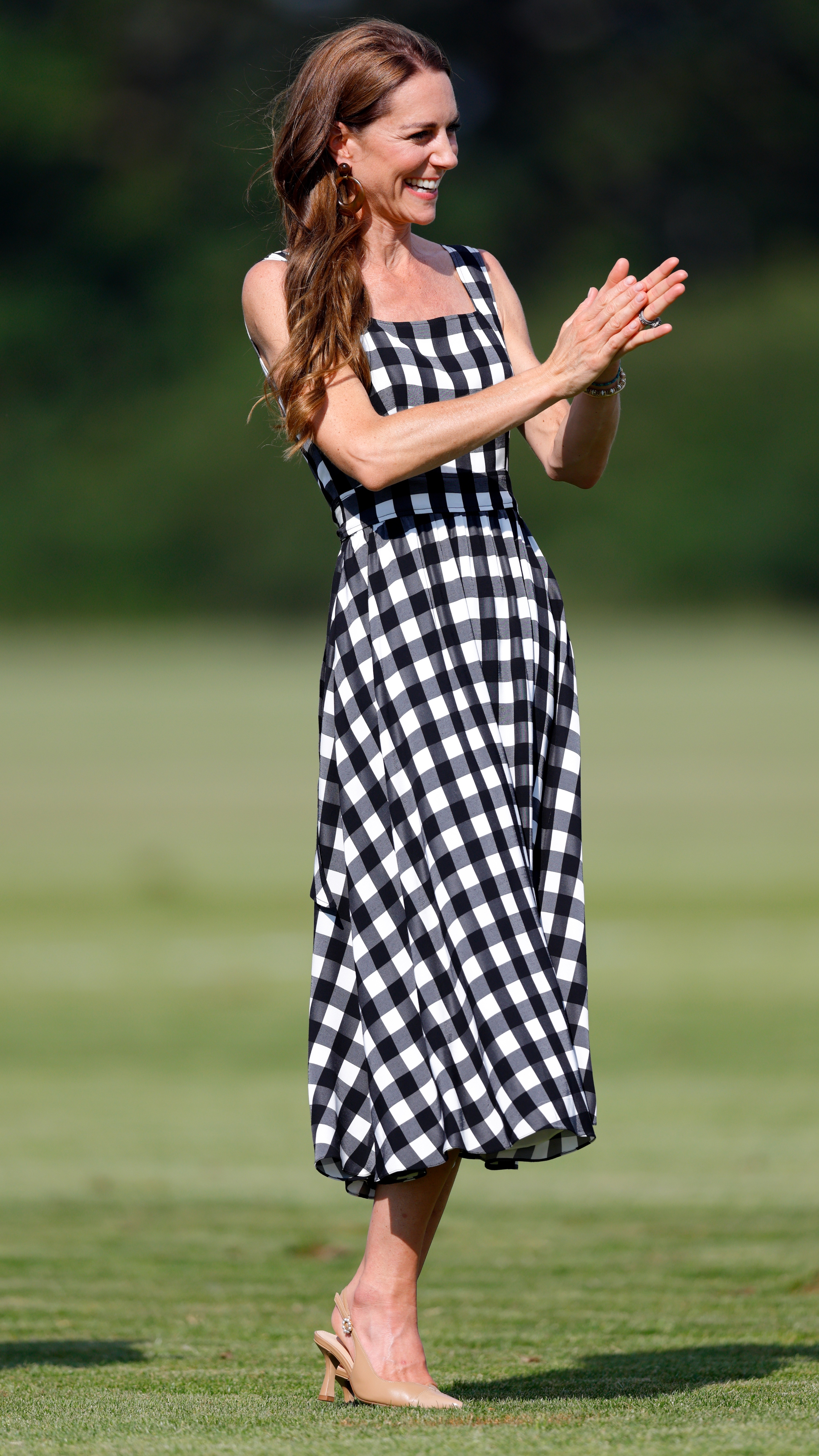 Catherine, Princess of Wales claps as she attends the DMMI Royal Charity Polo Cup 2026