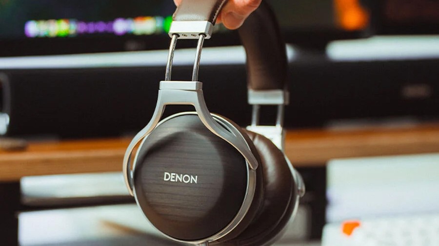 Lifestyle shot of AH D5200 headphones against the blurred background of a recording studio