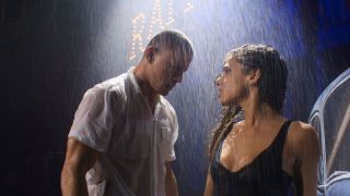 Magic Mike dances in the rain with a woman