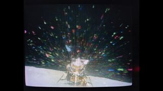 This image of the Lunar Module known as "Orion" during liftoff from the moon was taken from film beamed back to Earth from the RCA TV mounted on the Lunar Roving Vehicle.