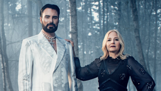 Witches of Essex 2025 Starring Rylan Clark and Prof. Alice Roberts, who stand in a spooky silvery wood in Essex for the three part docuseries