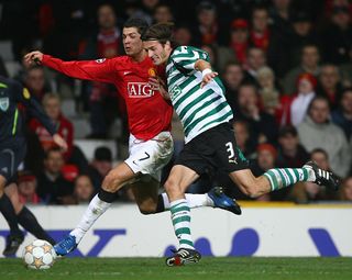 Cristiano Ronaldo of Manchester United battles for the ball with Marian Had of Sporting Lisbon during the UEFA Champions League Group F match between Manchester United and Sporting Lisbon at Old Trafford on November 27, 2007 in Manchester, England.