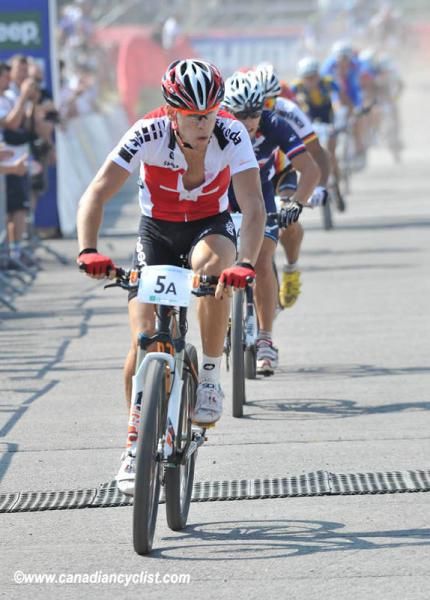 Switzerland leads the team relay en route to victory.
