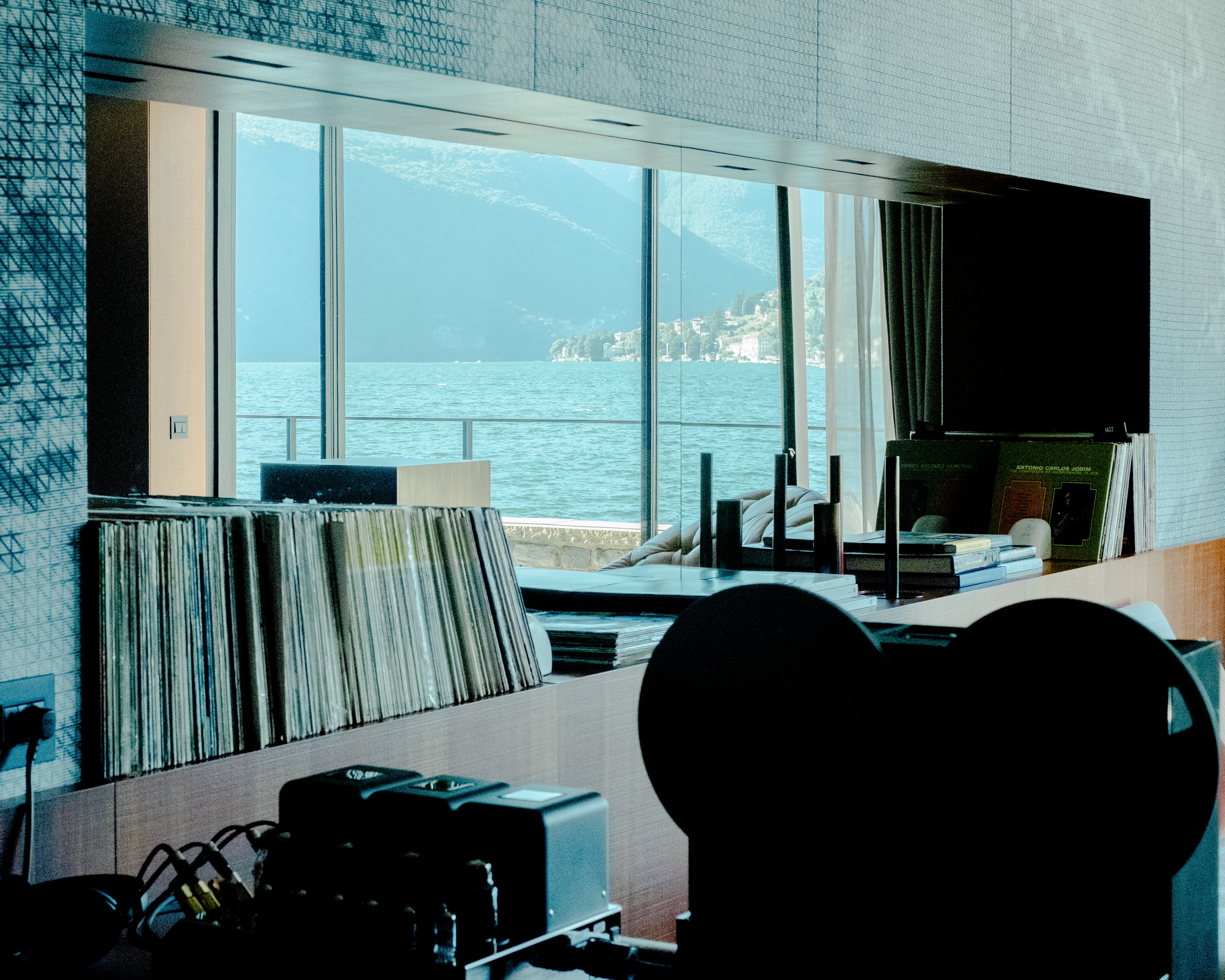A high-fidelity listening suite's mirrored wall lets the lakeview landscape surrounding the hotel indoors.