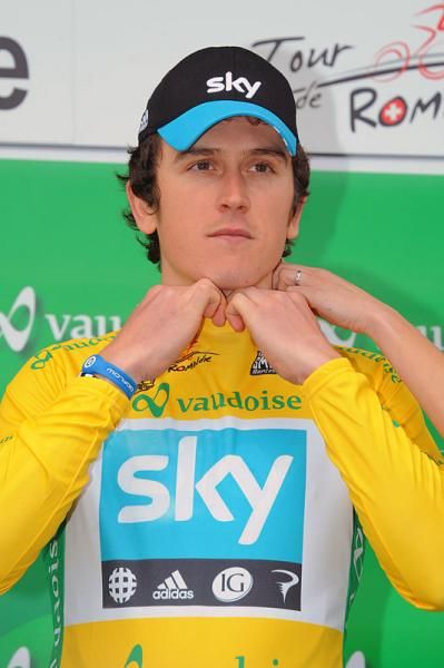 Geraint Thomas (Sky) dons the yellow leader's jersey after winning the prologue.
