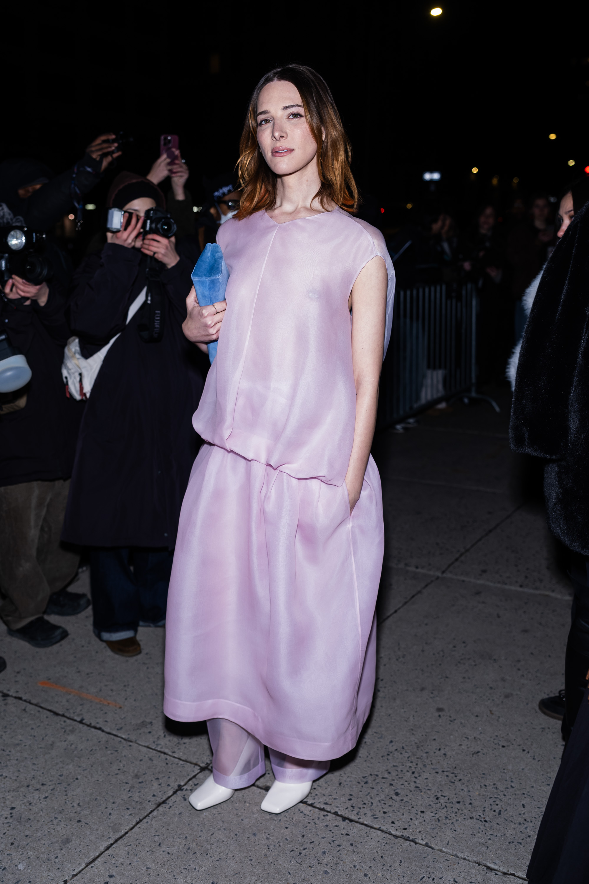 Hari Nef attends the KHAITE fashion show in a sheer look.