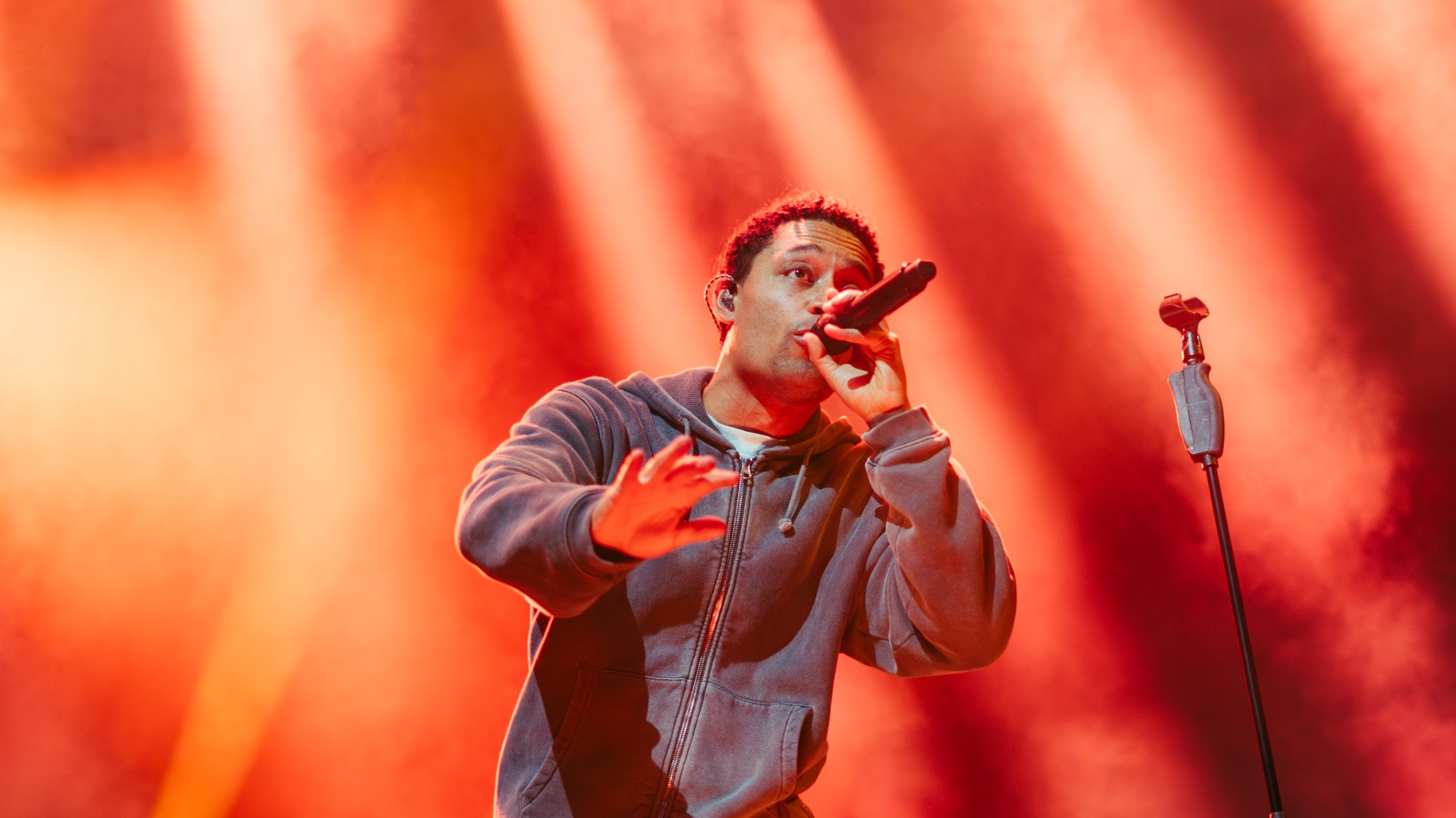 Loyle Carner performing at a concert
