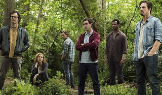 IT Chapter Two The Losers Club standing together in the woods