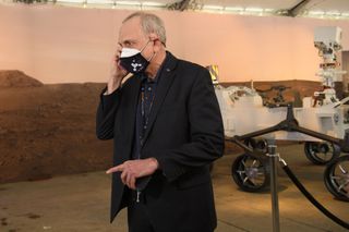 Acting NASA Administrator Steve Jurczyk receives a call from US President Joe Biden at NASA's Jet Propulsion Laboratory (JPL) following the successful Mars 2020 Perseverance rover landing on February 18, 2021 in Pasadena, California.