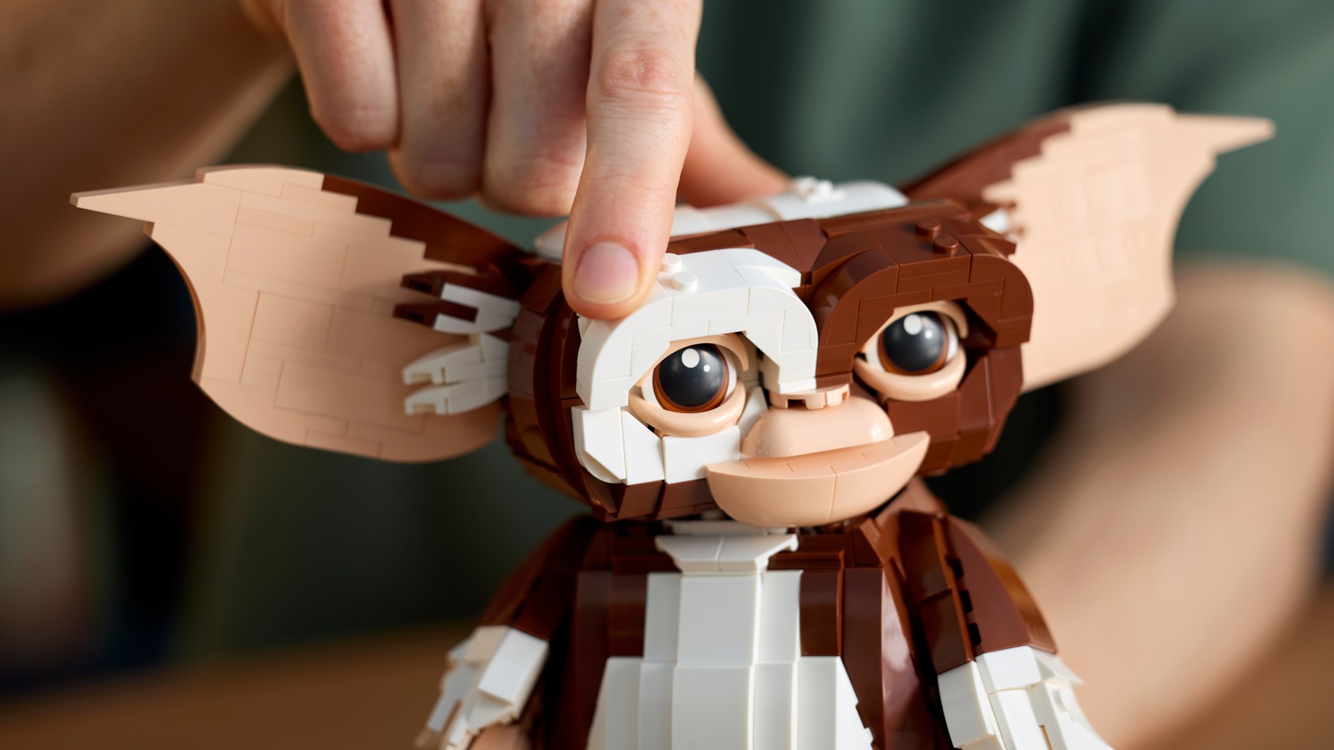 Lego Gizmo set being posed by builder