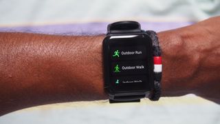 Workout tracking options on the Realme Watch 2, including outdoor walk and outdoor run