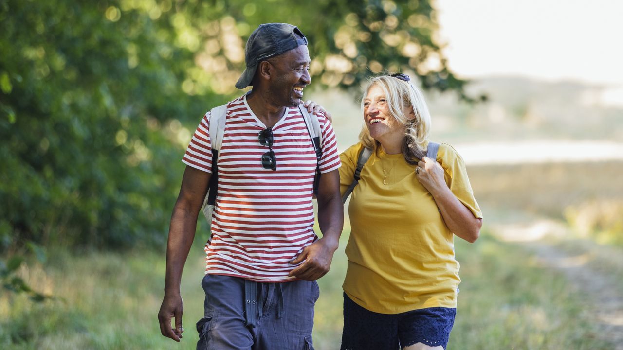 Two people enjoying a walk in a park