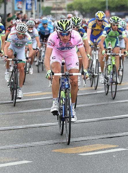 Franco Pellizotti (Liquigas) rides along clad entirely in pink.