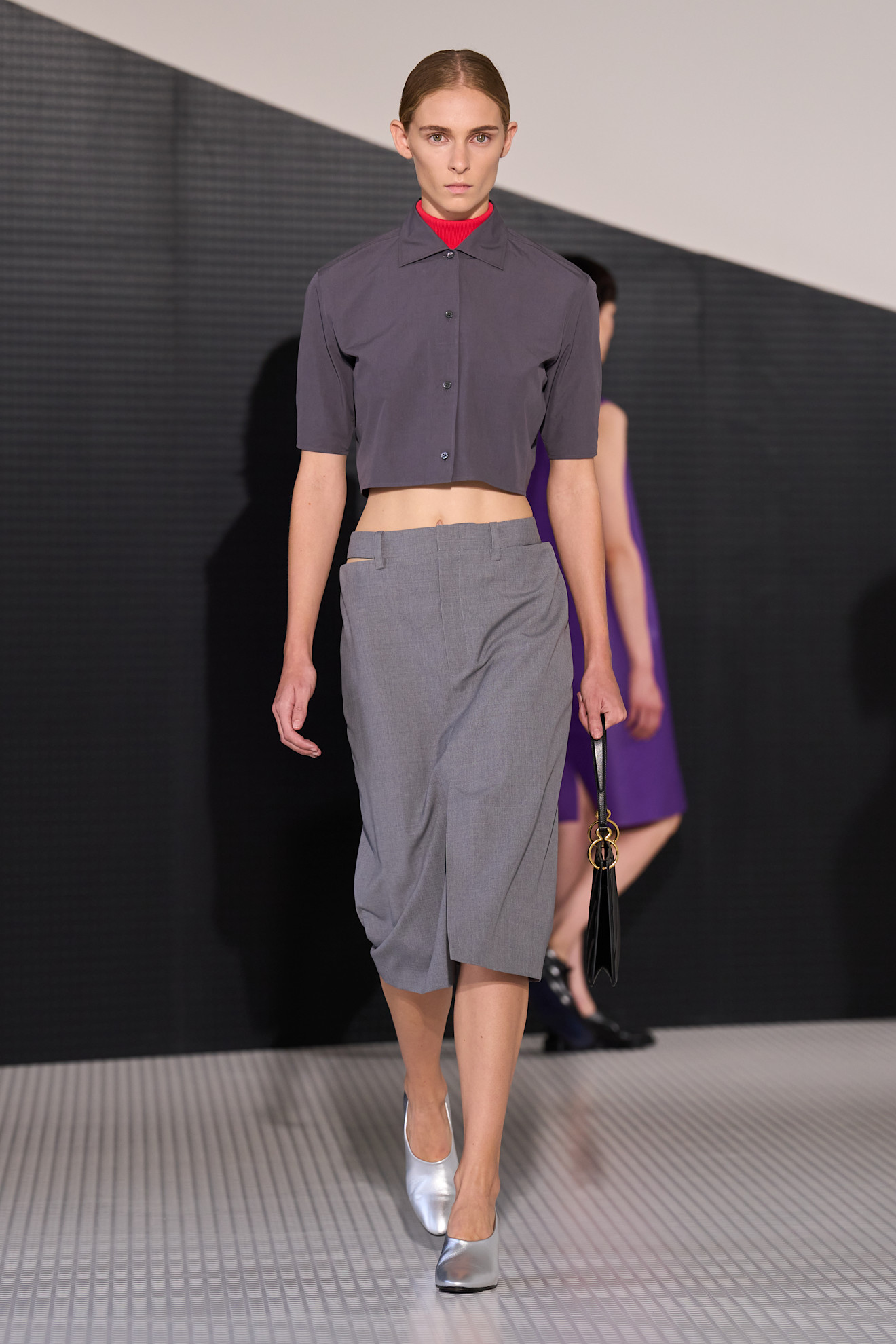 A model wore high-vamp flats on Jil Sander's Spring 2026 runway