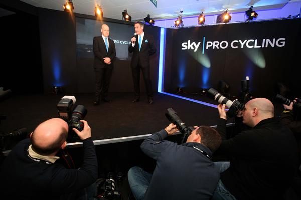 Manager David Brailsford is the focus for the photographers.
