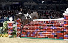 PETER SMYTH riding CAVALIER RUSTICANA during Puissance Show Jumping Class (Class 04), at The Equestrian.com Liverpool International Horse Show 2016 at Olympia, London, UK on 1st January 2016 liverpool international horse show discount codes