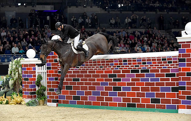 PETER SMYTH riding CAVALIER RUSTICANA during Puissance Show Jumping Class (Class 04), at The Equestrian.com Liverpool International Horse Show 2016 at Olympia, London, UK on 1st January 2016 liverpool international horse show discount codes