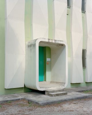 La Cité Oasis, a photographic series on La Grande Motte, shot by Charly Broyez & Laurent Kronental and showing sculptural, white and geometric modernist architecture in the south of france, surrounded by green spaces and in monumental scale