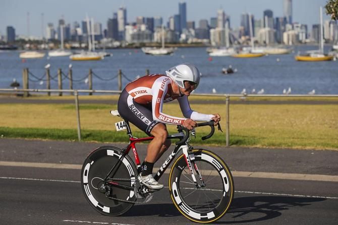 Jordan Kerby rides against a Melboure City backdrop.