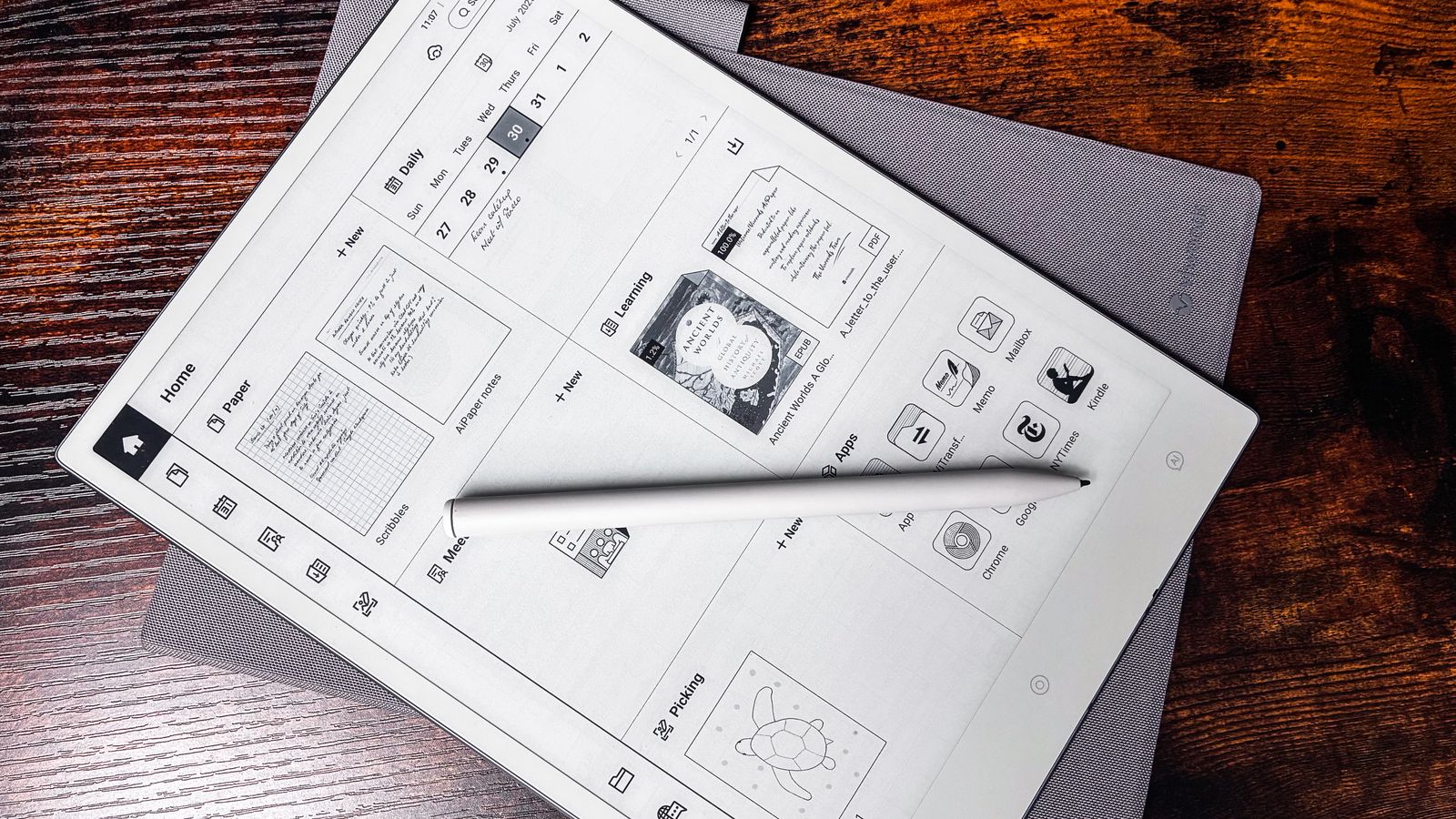 The AiPaper Gen2.5 Stylus Pen lying on top of the homescreen of the ViWoods AiPaper