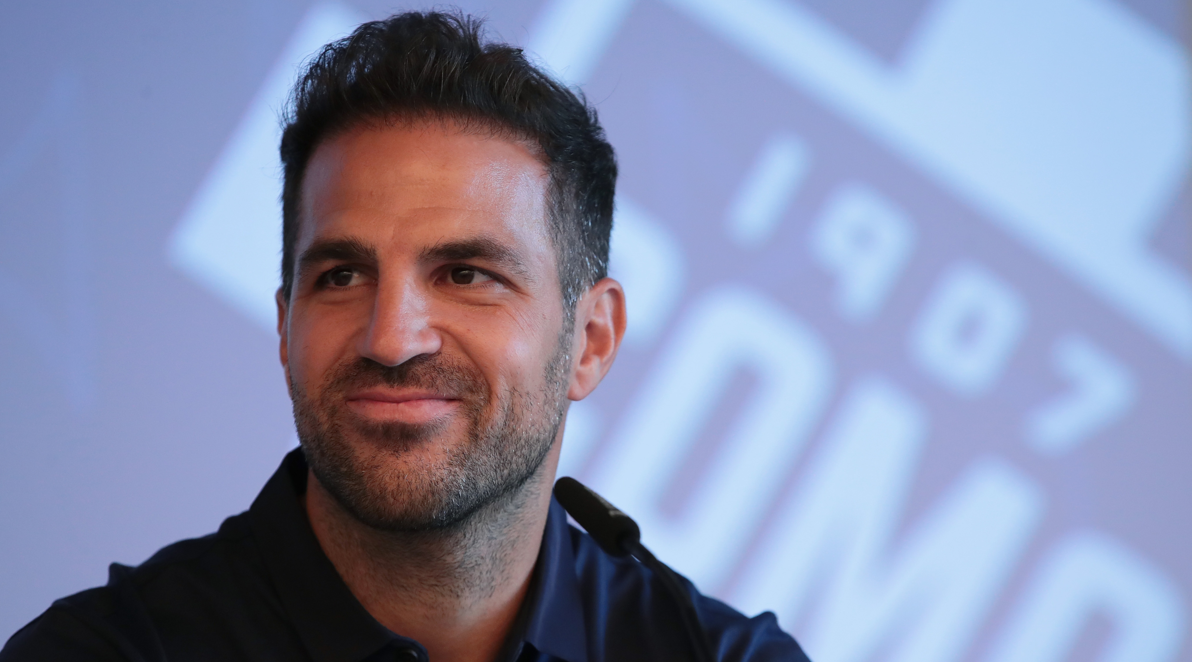 The new signing of Como 1907 Cesc Fabregas speaks with the media during the press conference at Hilton Lake Como on August 01, 2022 in Como, Italy