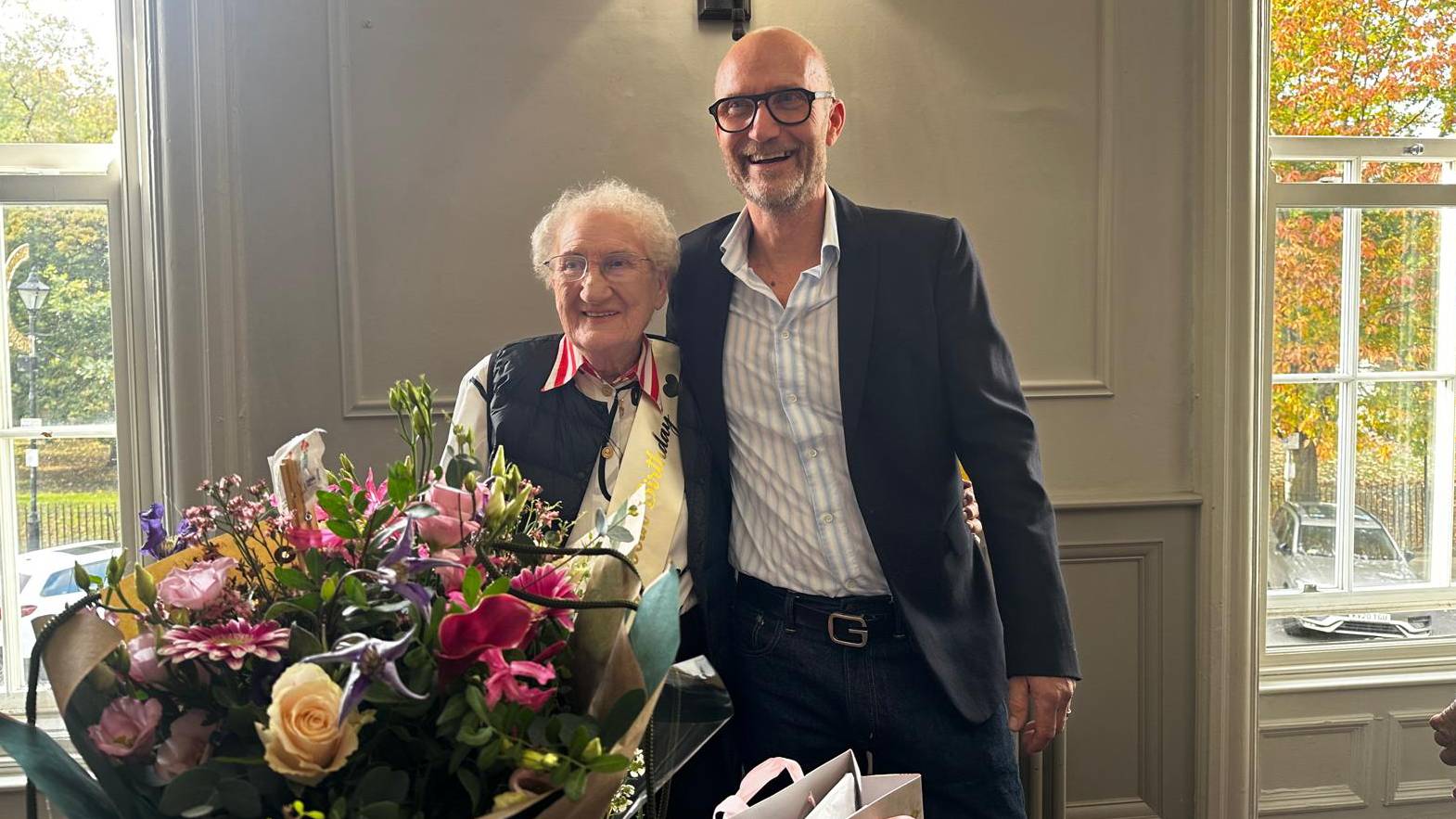 Margaret Montgomery with her son Graeme at her 100th birthday party