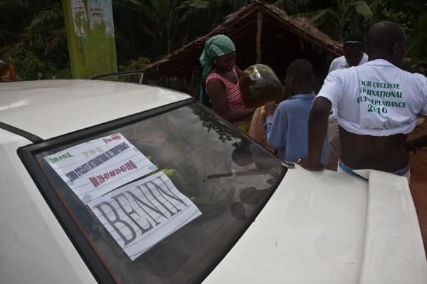 The Benin team car fuels up on roadside gas smuggled across the border from Nigeria