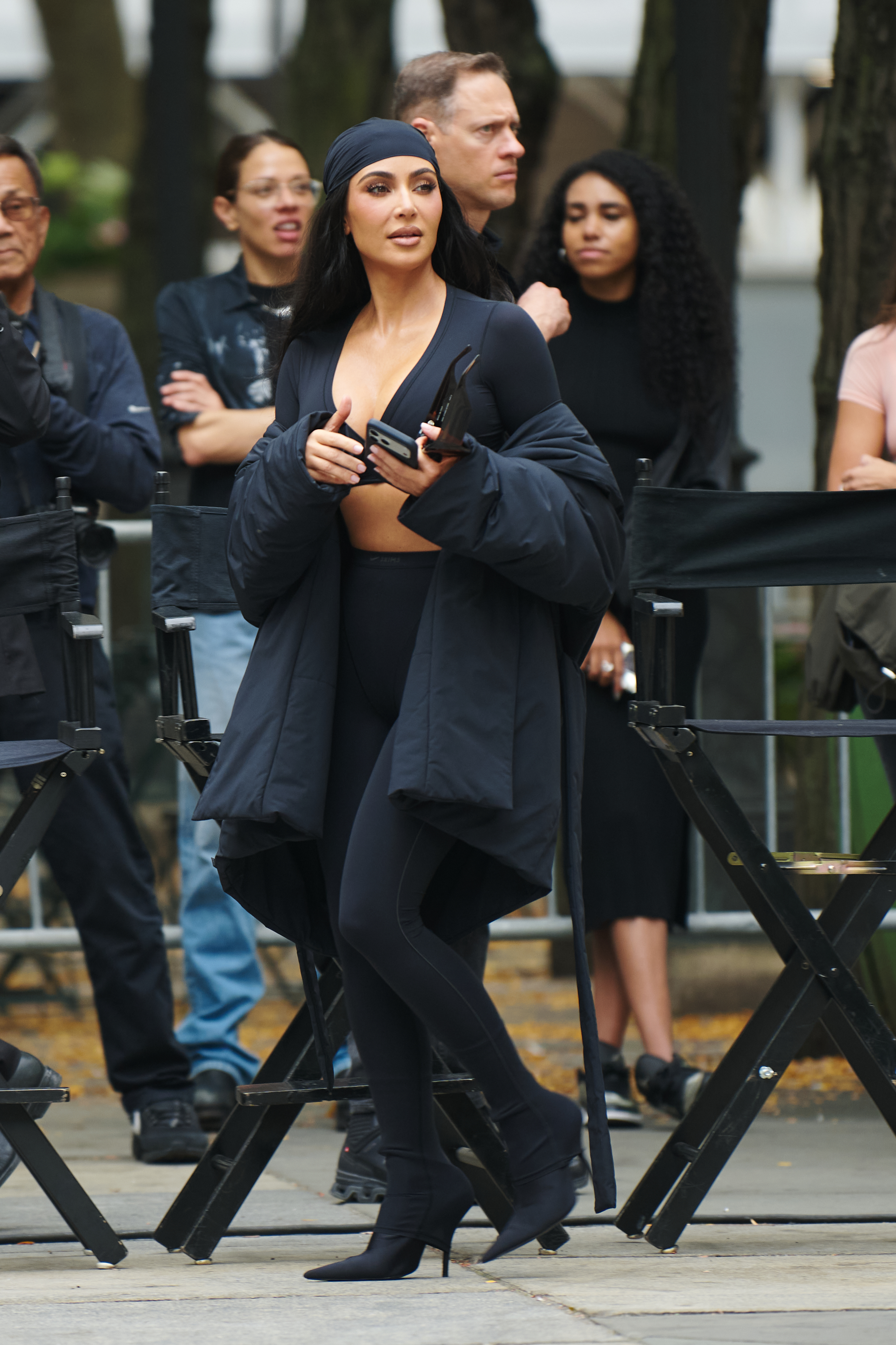 Kim Kardashian wore all-black pantaboots to celebrate the launch of NikeSKIMS