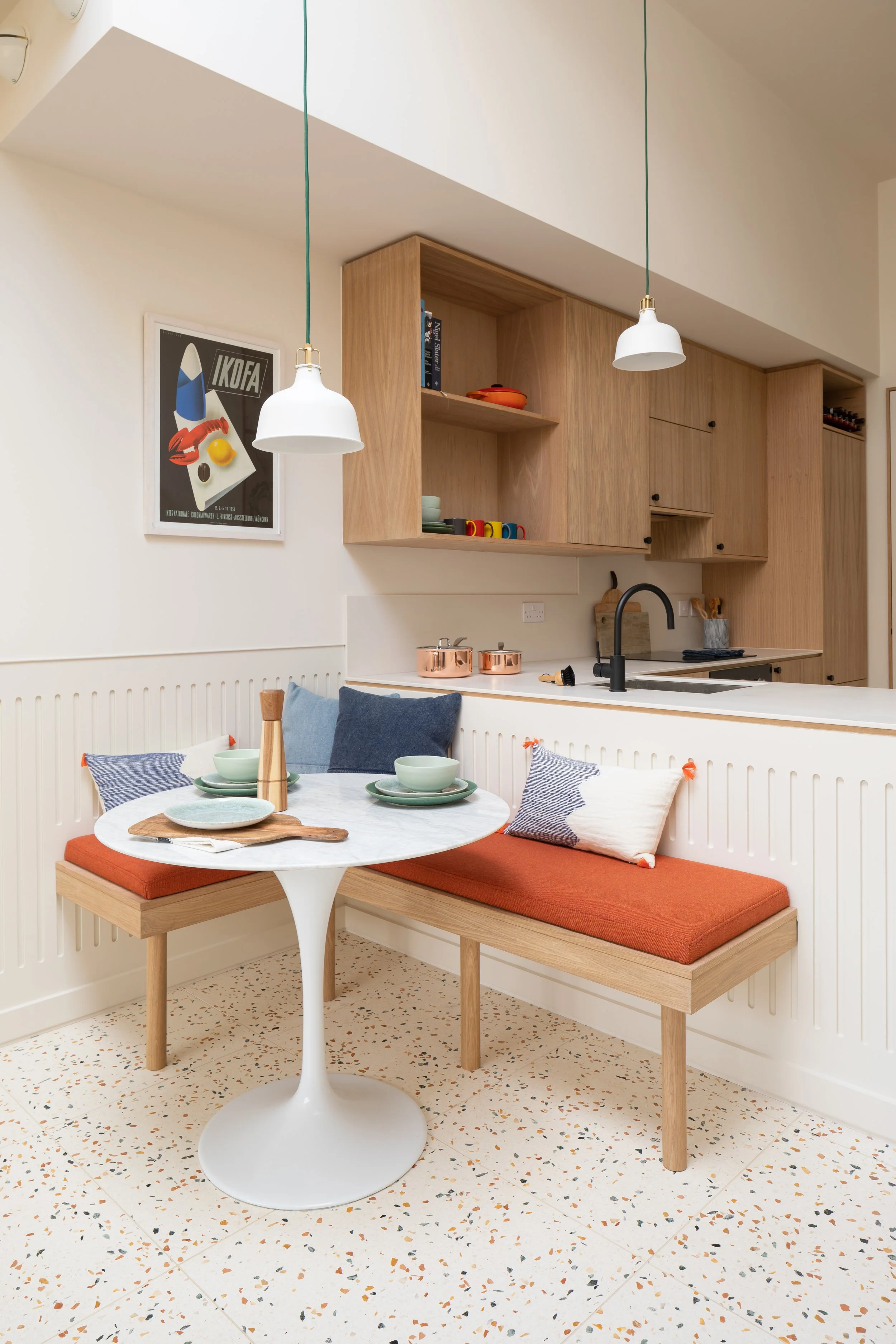 Small dining space in open plan kitchen