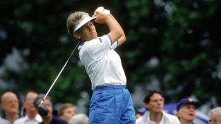 Patty Sheehan swings and watches the flight of her ball during the Women's U.S. Open Golf Championship circa July 1992 at the Oakmont Country Club