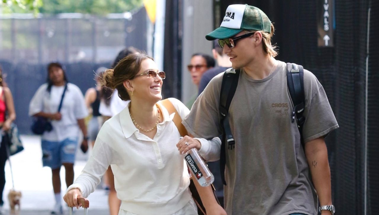 Millie Bobby Brown and her husband walk in New York wearing a matching white set