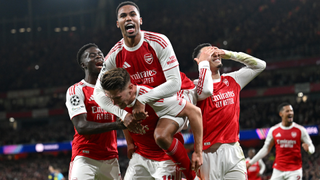 Viktor Gyoekeres of Arsenal celebrates scoring his team's fourth goal with teammate Gabriel during the UEFA Champions League 2025/26 League Phase MD3 match between Arsenal FC and Atletico de Madrid at Arsenal Stadium on October 21, 2025 in London, England. 