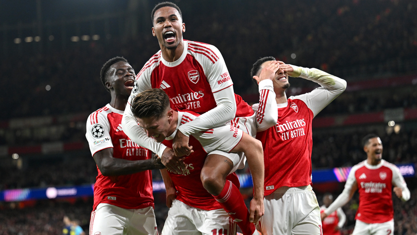 Viktor Gyoekeres of Arsenal celebrates scoring his team's fourth goal with teammate Gabriel during the UEFA Champions League 2025/26 League Phase MD3 match between Arsenal FC and Atletico de Madrid at Arsenal Stadium on October 21, 2025 in London, England. 