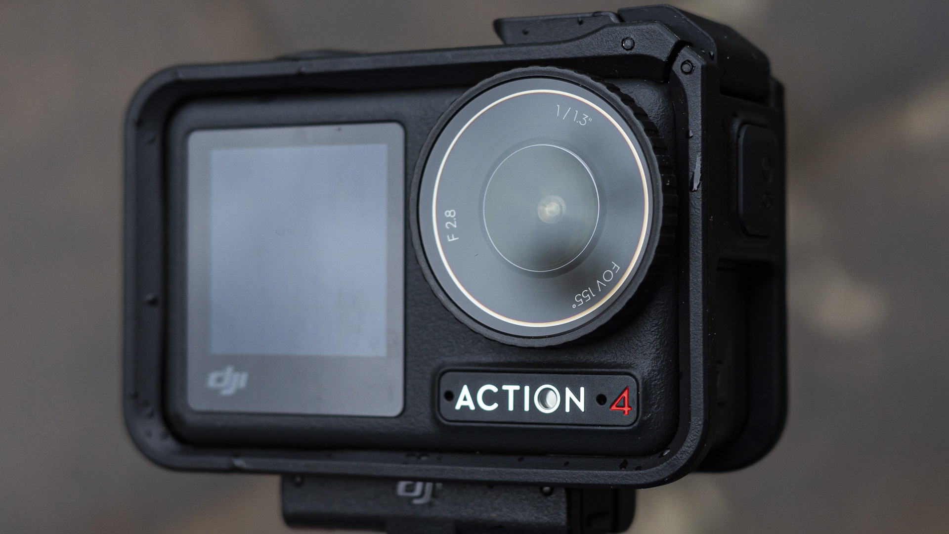 DJI Osmo Action 4 camera in protective cage optional accessory