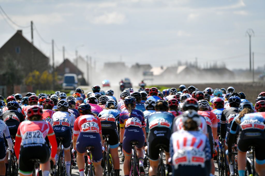 DE PANNE BELGIUM MARCH 25 The peloton during the 4th Oxyclean Brugge De Panne 2021 Women Classic a 1588km race from Brugge to De Panne Landscape OxycleanClassic UCIWWT on March 25 2021 in De Panne Belgium Photo by Luc ClaessenGetty Images