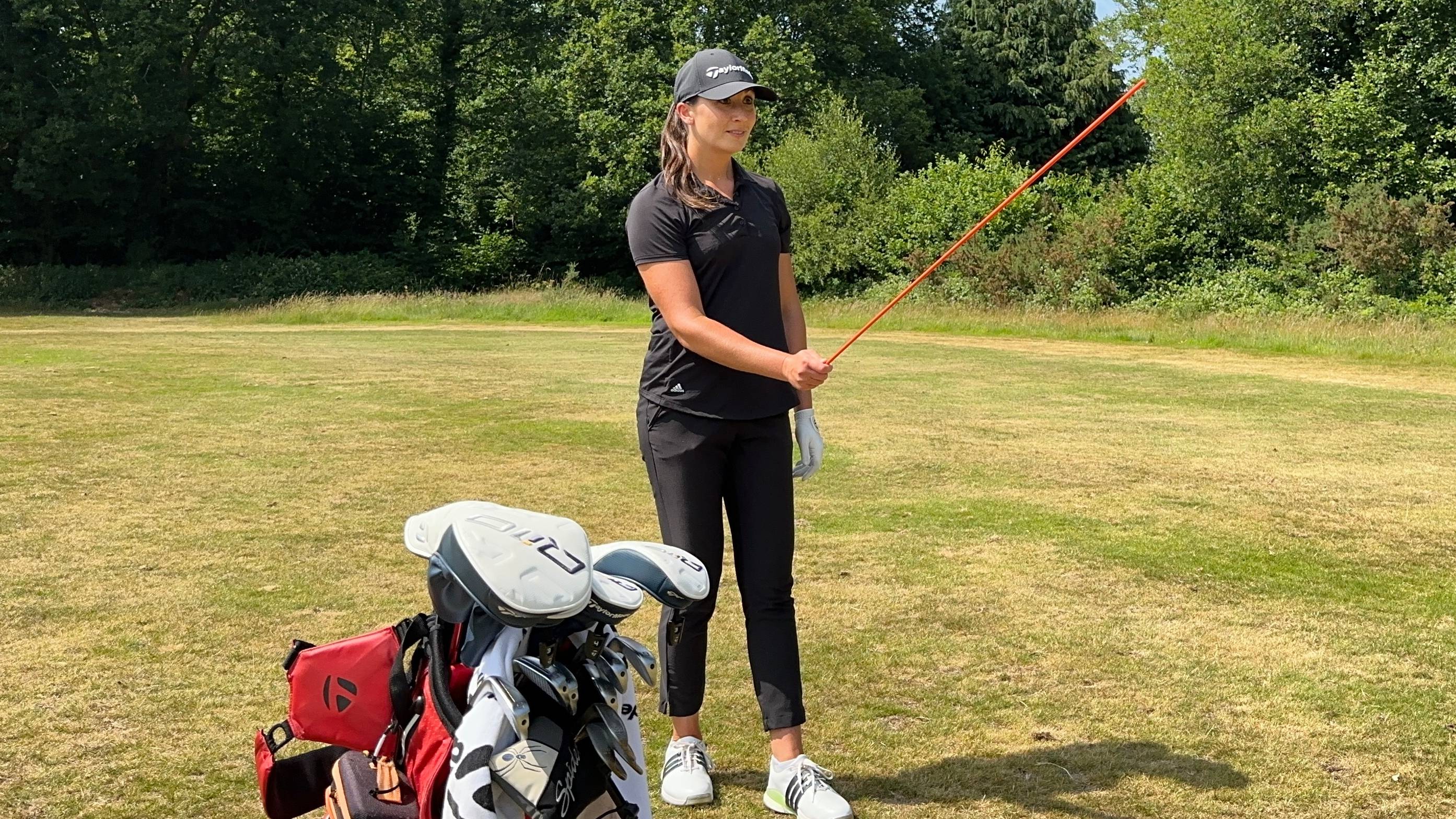 Jess Ratcliffe with an alignment stick